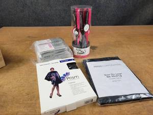 lot 1376 image: (2) New Salon Capes, Paul Mitchell Pardon my French Brushes and (12) Packages of 12 Diane 38 Cold Wave Rods