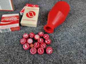 lot 1126 image: Vintage Automatic Toy Company SKI-HOOP Tin Ring Toss Game - Measures 18 L x 6-14 W x 5-14 H - Playing Cards, Vintage Punch Board Game, Pill Pool Bottle with Markers, and MORE