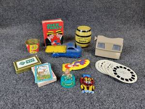 lot 1128 image: Vintage Toy Lot - Wyandotte Toy Truck, Viewmaster with Reels from the 50s and 60s, Tin Clicker Toys, Playing Cards, Centaur Productions Pinky Dancing Toy, and MORE