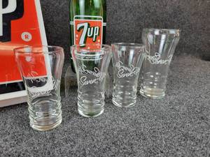 lot 1135 image: Lot of 7-Up Memorabilia - Sign (Fits a 10-18 x 11-78 Opening), 1 Pt., 12 oz. Bottle, and (4) Glasses with Seven-Up Script