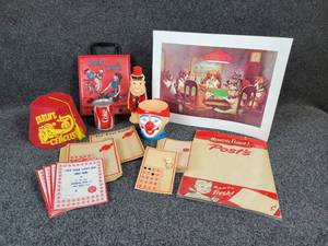 lot 1138 image: General Store Gambling Punch Cards (30), Shrine Circus Hat, Circus Mug, Fred Flintstone 11 oz. Drinking Bottle, POST Cereal Advertisement Blank (Measures 8-12 W x 12-12 H) and MORE