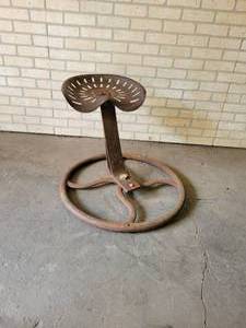 lot 1034 image: Custom Made tractor Seat Chair - Tractor Seat on Cast Iron Wheel - NO SHIPPING