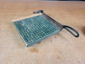 lot 1071 image: Antique DANDY Mini Paper Cutter by Milton Bradley Co. - Overall about 9 x 9