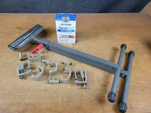 lot 1094 image: Protocol Model RS-011B Material Roller - Adjustable Height, Aluminum Topper Clamps and Rust-o-Leum Liquid Repelling Treatment Kit - NO SHIPPING