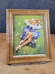 lot 1262 image: Vintage Elvgren Pin Up Girl Framed Print Lazy Days - Overall 17.5 x 14.5