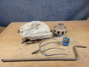 lot 1300 image: Antique Cyclone Hand Seeder, Wood Wheel Hub, Pitchfork and Belt Pulley - NO SHIPPING