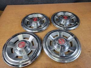 lot 1302 image: Original Set of Hubcaps for 1969 Pontiac Firebird