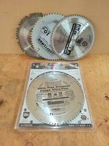 lot 114 image: New FRUED 10 Saw Blade Pack (80 Tooth and 24 Tooth)  (3) Used 10 Blades