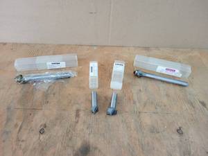 lot 129 image: (4) MAGNATE 12 Shank Router Bits