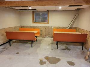 lot 354 image: Pair of Diner Booths from the Klossner House - Measures 57 x 61 x 35 as is. The benches and table detach from the frame for easy loading NO SHIPPING