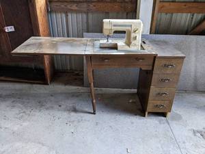 lot 247 image: Vintage New Home My Excel 15S Sewing Machine In Cabinet - Overall about 36 x 20 x 29 Tall - NO SHIPPING