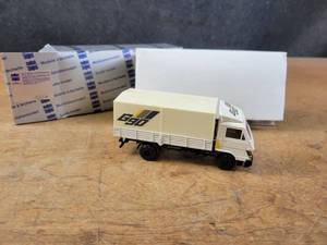 lot 1640 image: Man Platform Tarpaulin Truck Diecast Model - 150 Scale - Conrad Model 4136