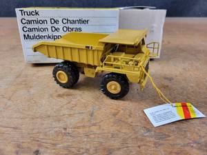 lot 1649 image: Caterpillar 769C Off-Highway Dump Truck Diecast Model - 150 Scale - NZG Model 222