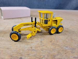 lot 1661 image: Caterpillar 12G Motor Grader Diecast Model - 150 Scale - NZG Model 150