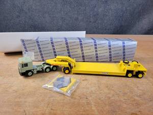 lot 1635 image: Man F90 Truck with Schmitz Heavy Low Loader Trailer Diecast Model - 150 Scale - Conrad Model 4111