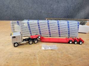 lot 1637 image: Freightliner Cabover Semi w Lowboy Trailer Diecast Model - 150 Scale - Conrad Model 3512