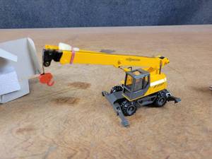 lot 1683 image: Sennebogen 613M Wheel Crane Diecast Model - 150 Scale - NZG Model 392