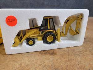 lot 1686 image: Caterpillar 428B Backhoe Loader Diecast Model - 150 Scale - NZG Model 2851