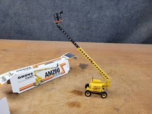 lot 1711 image: GROVE Manlift AMZ66 Telescopic Boom Aerial Work Platform Diecast Model - 150 Scale - Conrad Model 2502