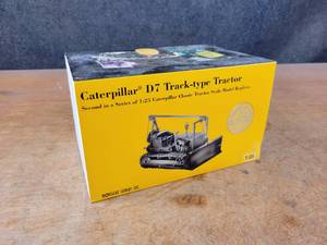lot 2623 image: Caterpillar D7 Track Type Tractor Diecast Model - Military Green - 125 Scale - NZG Model 386 - Limited Edition #3375 of 10,000