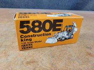 lot 2639 image: Case 580E Construction King Backhoe Loader Diecast Model - 135 Scale - Conrad Model 2933
