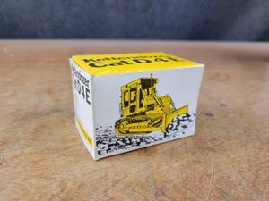 lot 2676 image: Caterpillar D4E Dozer Diecast Model - 150 Scale - NZG Model 205