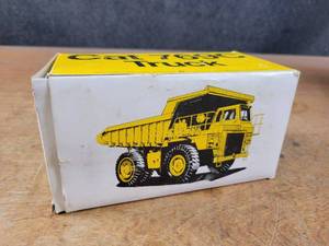 lot 2677 image: Caterpillar 769C Dump Truck Diecast Model - 150 Scale - NZG Model 222