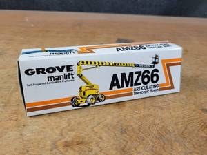 lot 2681 image: GROVE Manlift AMZ66 Telescopic Boom Aerial Work Platform Diecast Model - 150 Scale - Conrad Model 2502