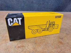 lot 2684 image: Caterpillar D250E Articulated Truck Diecast Model - 150 Scale - NZG Model 412 - Official Launch Edition #501