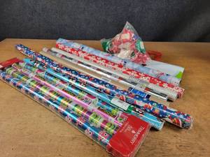 (11) Rolls of Christmas Wrap, Bows and Gift Bag - (9) rolls are sealed - NO SHIPPING