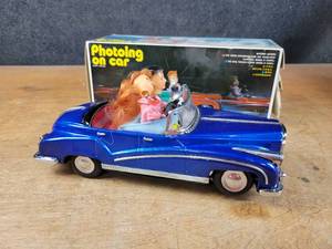 Vintage Photoing on Car Tin Battery Operated Car in Original Box Car is about 12 Long