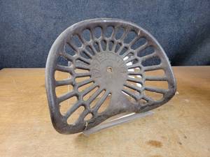 Antique DEERING Cast Iron Tractor Seat