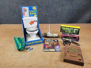 Toilet Bank, John Deere Tractors, Cannon replica and More