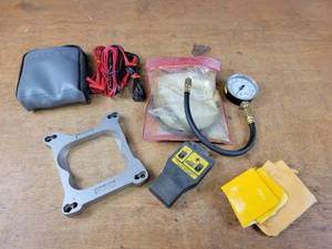 lot 55 image: Lot of FLUKE Meter Probes, Mr. Gasket Part No 1932 4-Barrel Carburetor Riser, Compression Tester and More