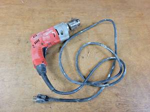 lot 98 image: Milwaukee Model 0234-6, 12 Reversable Electric Drill - Tested and Works