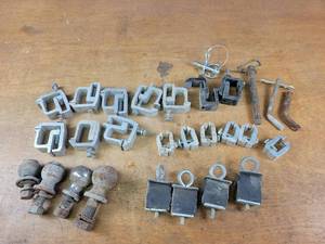 lot 123 image: Large Lot of Aluminum Topper Clamps, Hitch Pins, Hitch Balls and More