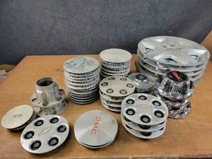 lot 150 image: Huge Lot of GM Center Caps and Hubcaps - NO SHIPPING