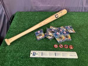 lot 136 image: Twins Memorabilia - Michael Cuddyer Bat, Buttons, 1963 Schedule Ruler & Mini Baseballs