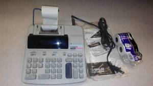 lot 15 image: 5 Texas Instruments Calculator & Tape, Instructions.
