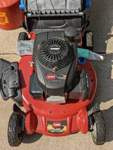 Toro Personal Pace Super Recycler Lawnmower and Gas Can
