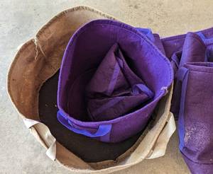 Assorted Fabric Grow Bags and Watering Can