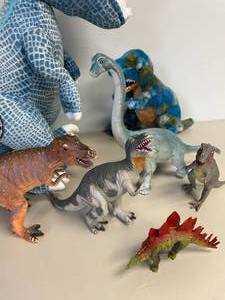 lot 23 image: Lot of Toy Dinosaurs and Jurassic World Blue Plush