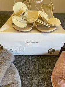 lot 45 image: Lot of Womens Fuzzy Slippers and Shoes.