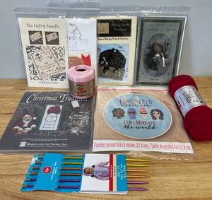 lot 31 image: Lot of Cross Stitch Patterns and Knitting Supplies