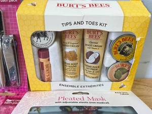 lot 72 image: Burts Bees Hand and Foot Cream Set with 2 Nail Trimmer Sets and Vera Bradley Face Masks
