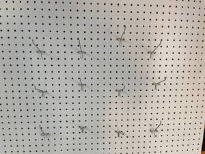 lot 59 image: Large 8x4 White Pegboard Sheet with 15 Peg Hooks