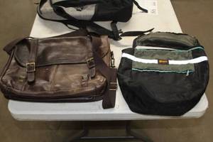 lot 85 image: Lot of (2) Carry Bags - Samsonite Leather Briefcase, REI Novara Soft Side Bag