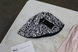 lot 130 image: H&M Mens Reversible Hat