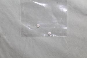 lot 189 image: 0.95ct Matched Pair Natural Round Brilliant Diamonds