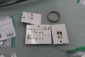 lot 193 image: Lot of (1 Bag) Costume Jewelry Earrings and  a Bracelet